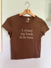 Load image into Gallery viewer, Closed my Book to be Here Baby Tee
